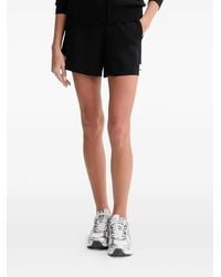 Guess - Short Court À Lien De Resserrage Et Rayures Sur Les Côtés - Lyst