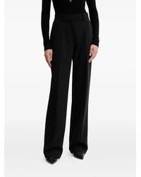 Guess - Logo-Detail Trousers - Lyst