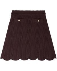 Sandro - Button-Detail Scallop-Hem Knitted Skirt - Lyst