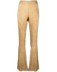 Metallic Acne Studios Silk Flared Plisse Pants in Gold Womens Clothing Trousers Slacks and Chinos Wide-leg and palazzo trousers 