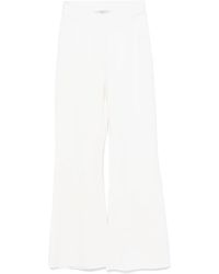 Charlott - Knitted Wool Flared Trousers - Lyst