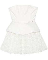 Nissa - Vestido corto con peplum y detalle floral - Lyst