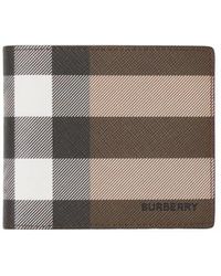Burberry - Cartera International plegable - Lyst