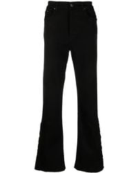 Amiri - Flared-Leg Cotton Jeans - Lyst