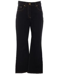 Versace - Logo-Patch Topstitched Jeans - Lyst