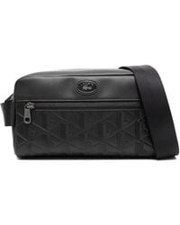 Lacoste - Borsa A Tracolla Con Monogramma Goffrato - Lyst
