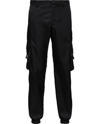 Prada - Re-nylon Buckle-embellished Tapered Slim-fit Recycled-nylon Trousers - Lyst