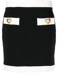 Moschino - Minifalda con botones en forma de corazón - Lyst