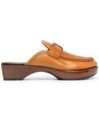 Tod's - Logo-Plaque Leather Mules - Lyst