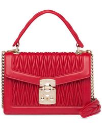 miu confidential matelassé leather shoulder bag