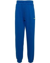 Les Benjamins - Logo-Print Cotton Track Pants - Lyst