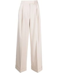 D.exterior - Pressed-Crease Flared Trousers - Lyst