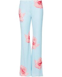 KENZO - Flared Broek Met Roosprint - Lyst