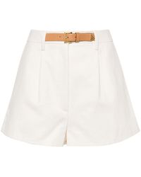 Prada - Pantalones cortos con cinturón - Lyst