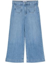 PAIGE - Jeans crop a gamba ampia - Lyst