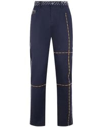 Moschino - Contrast-Stitch Trousers - Lyst