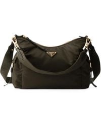 Prada - Explore Large Re-Nylon And Leather Bag - Lyst