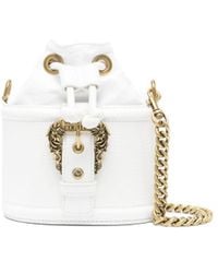 Versace - Engraved-logo Grained Bucket Bag - Lyst