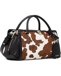 Guess - Sac Porté Épaule À Plaque Logo Et Imprimé Vache - Lyst