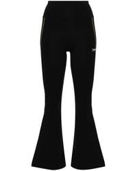 Versace - Flared Legging Met Logo-Applicatie - Lyst