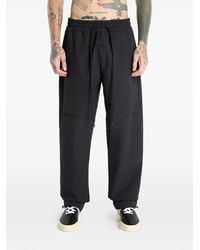 adidas - Brushback Woven Storm Track Pants - Lyst
