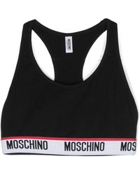 Moschino - Reggiseno sportivo con banda logo - Lyst