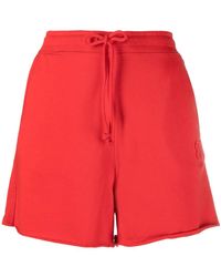 Ganni - Logo-Embroidered Cotton Track Shorts - Lyst