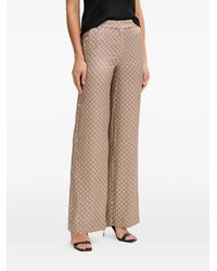 MARCIANO BY GUESS - Logo-Patterned Trousers - Lyst