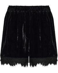 Ganni - Lace-Trim Velvet Shorts - Lyst