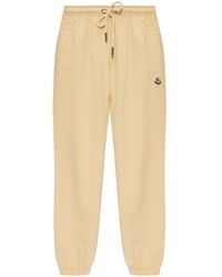 Moncler - Pantalones de chándal con parche del logo - Lyst