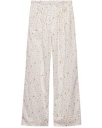 Prada - Pantalon En Coton À Fleurs - Lyst