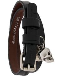 Alexander McQueen Pulsera cruzada con calavera - Negro