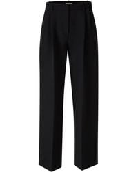 KHAITE - High-Waist-Hose mit Bundfalten - Lyst