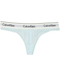 Calvin Klein - Tanga con logo en la cintura - Lyst