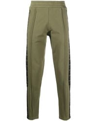 Moschino - Logo-Print Cotton Track Trousers - Lyst