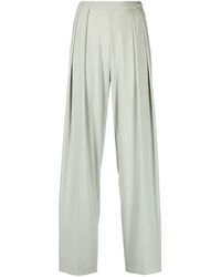 Norma Kamali - Pleated Tapered Trousers - Lyst