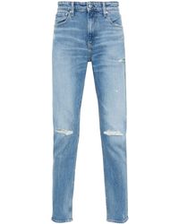 Calvin Klein - Distressed Tapered-leg Jeans - Lyst