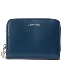 Calvin Klein - Monogram-Charm Leather Wallet - Lyst
