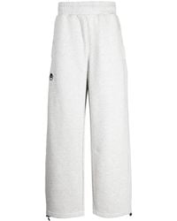 Izzue - Logo-Appliqué Wide-Leg Trousers - Lyst