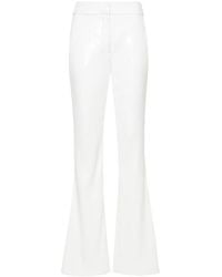 Genny - Sequinned Flared Trousers - Lyst