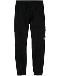 Calvin Klein - Logo-Patch Track Pants - Lyst