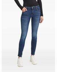 Guess - Vaqueros Con Logo Triangular - Lyst