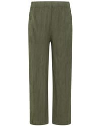 GONGDID DESIGN - Plissé-Effect Striped Trousers - Lyst