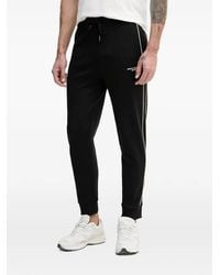 ARMANI EXCHANGE - Logo-Print Piped Track Pants - Lyst