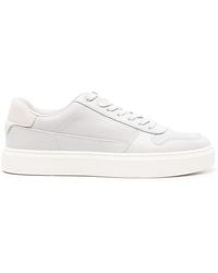 Calvin Klein - Logo-Print Leather Sneakers - Lyst