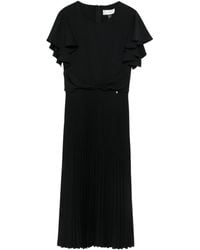 Nissa - Vestido midi plisado con volantes - Lyst