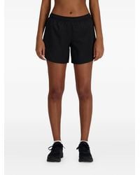 New Balance - Logo-Print Shorts - Lyst