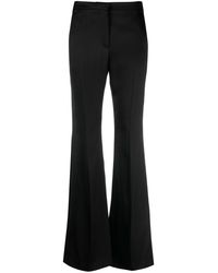 Givenchy - Pantalon en coton à coupe évasée - Lyst
