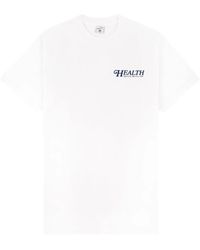 Sporty & Rich - Camiseta con logo 70s Health - Lyst