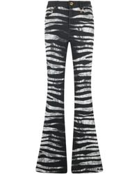 Roberto Cavalli - Zebra-Print Jeans - Lyst